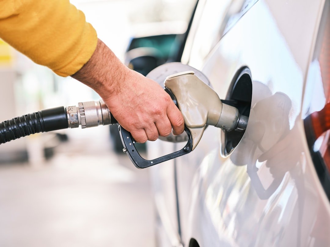 Car refueling at a gas station in the UAE